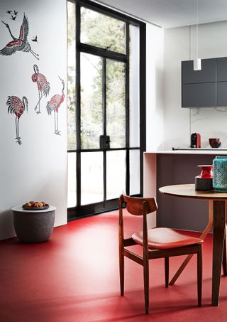 Red resin flooring in a kitchen