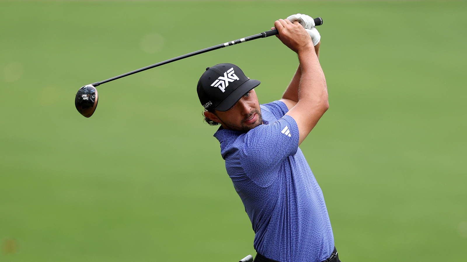 Marco Penge hits a shot into the green