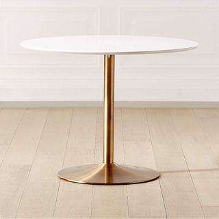 brass dining table with white top