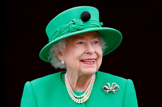 Queen Elizabeth II stands on the balcony of Buckingham Palace following the Platinum Pageant on June 5, 2022 in London, England