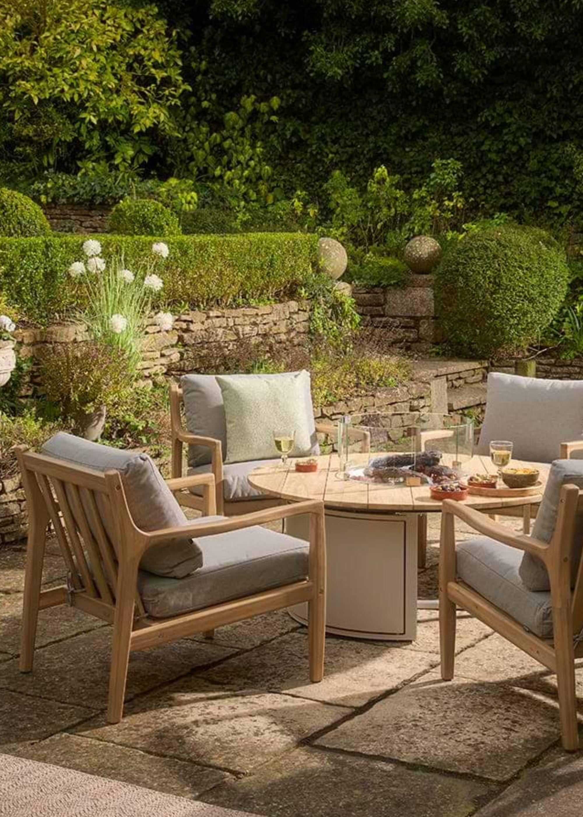 A fire pit table dining set from Cox &amp;amp; Cox