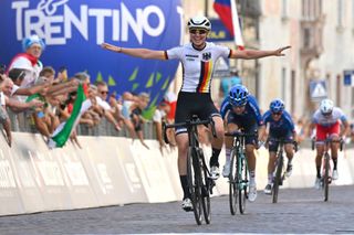 German cyclist Linda Riedmann celebrates as she crosses the finish line and win the UEC European women junior road cycling championships in Trento on September 10 2021 Photo by Alberto PIZZOLI AFP Photo by ALBERTO PIZZOLIAFP via Getty Images