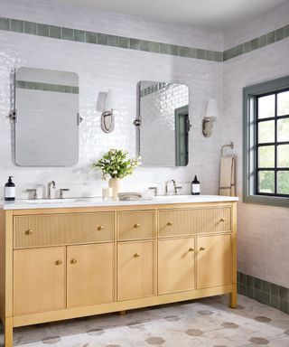 A blue and white bathroom designed by Shea McGee for Ann Sacks