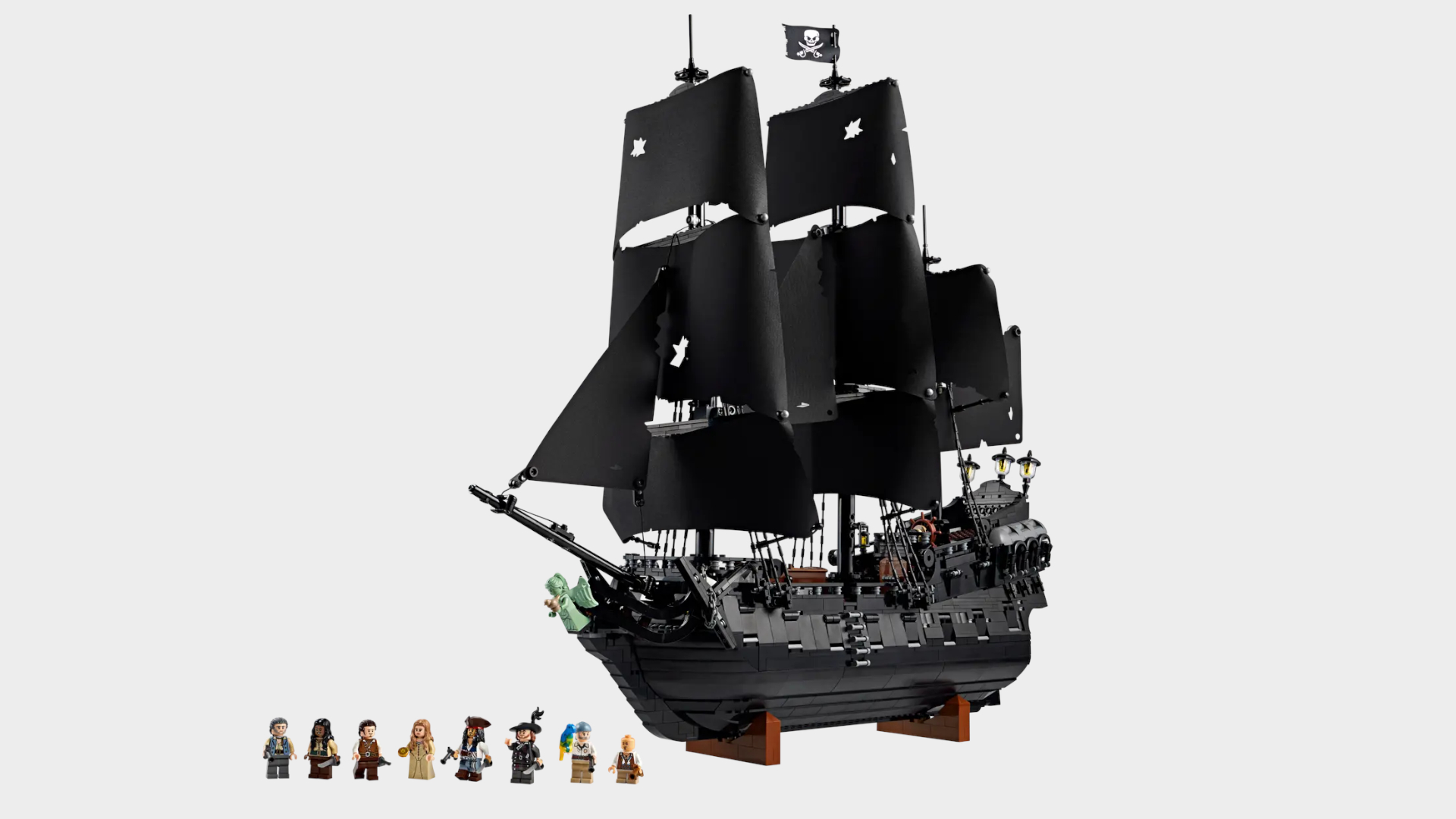 Lego Captain Jack Sparrow's Pirate Ship set and minifigures against a plain background