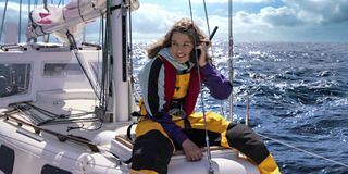 Jessica Watson sailing and talking on a walkie talkie