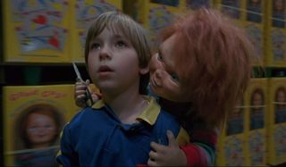 Child's Play 2 Chucky threatening Andy in the Good Guys' warehouse