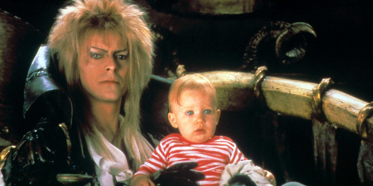 Labyrinth Jareth holds Toby in a chair