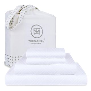 A stack of Threadmill Home Linen Celine Hotel White Sheets