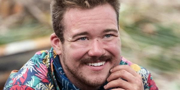 Zeke Smith smiling on Survivor