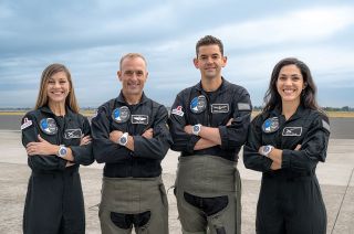 The Polaris Dawn crew with their IWC Schaffhausen Pilot's Watch Chronograph Edition watches. From left: mission specialist Anna Menon, pilot Scott "Kidd" Poteet, commander Jared Isaacman and mission specialist Sarah Gillis.