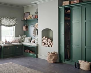 green mudroom with closed and open storage