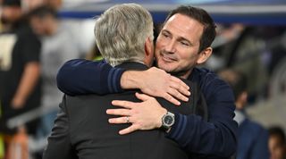 Real Madrid manager Carlo Ancelotti and Chelsea interim manager Frank Lampard embrace prior to the UEFA Champions League quarter-final first leg match between Real Madrid and Chelsea at the Santiago Bernabeu on April 12, 2023 in Madrid, Spain.