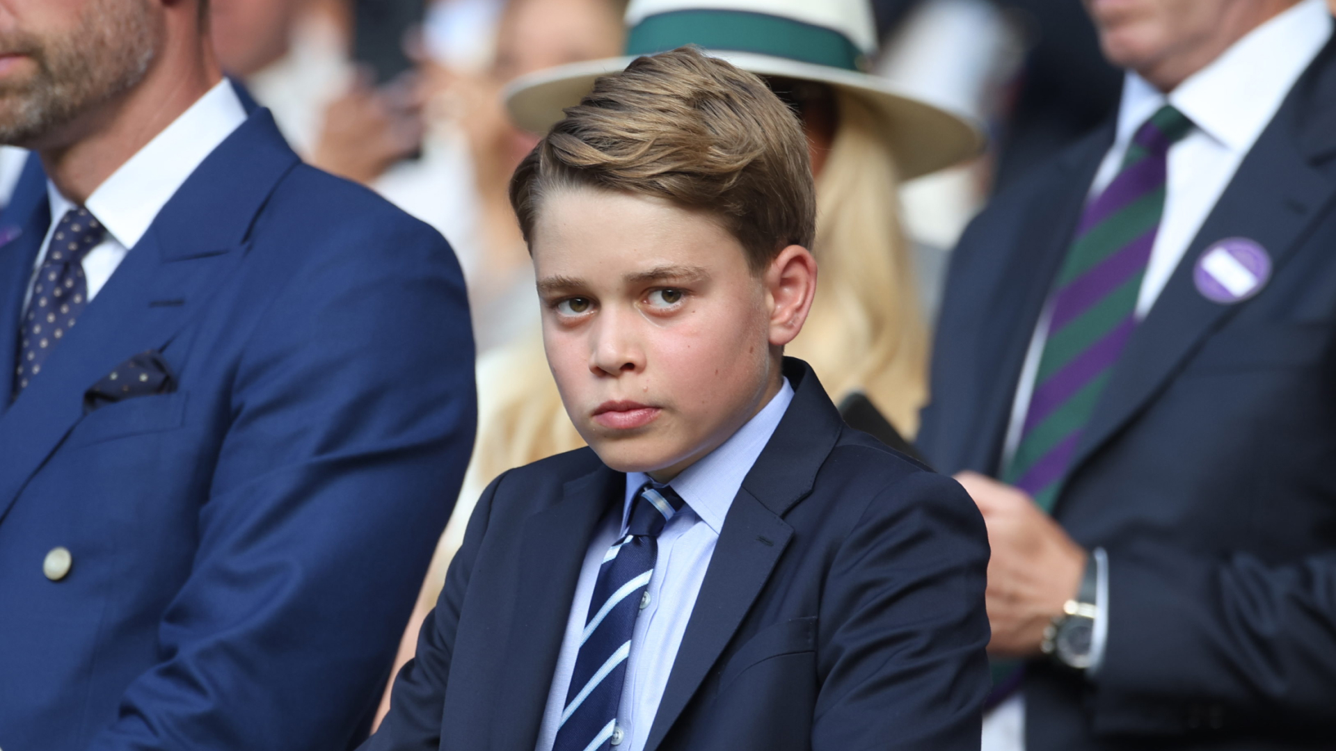 Prince George wears a suit and tie to Wimbledon on July 13 with father Prince William and sister Princess Charlotte