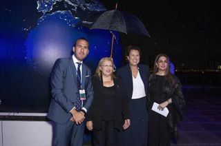 Manlio Di Stephano, Under-Secretary of State of Italy (left); Marie-Louise Coleiro Preca, President of Malta (center-left); Simonetta Di Pippo, Director of UN Office for Outer Space Affairs (center-right); and Namira Salim, Founder and Executive Chairperson of Space Trust (right) stand next to the Black Marble Earth at "Space2030: Space as a Driver for Peace."