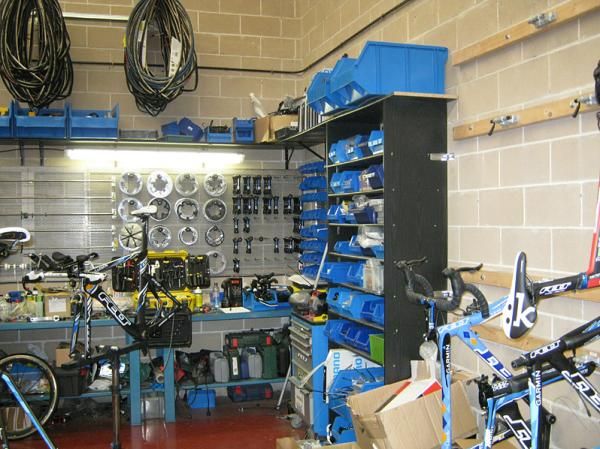 The mechanics' workspace is kept in immaculate condition, with every item ordered precisely.