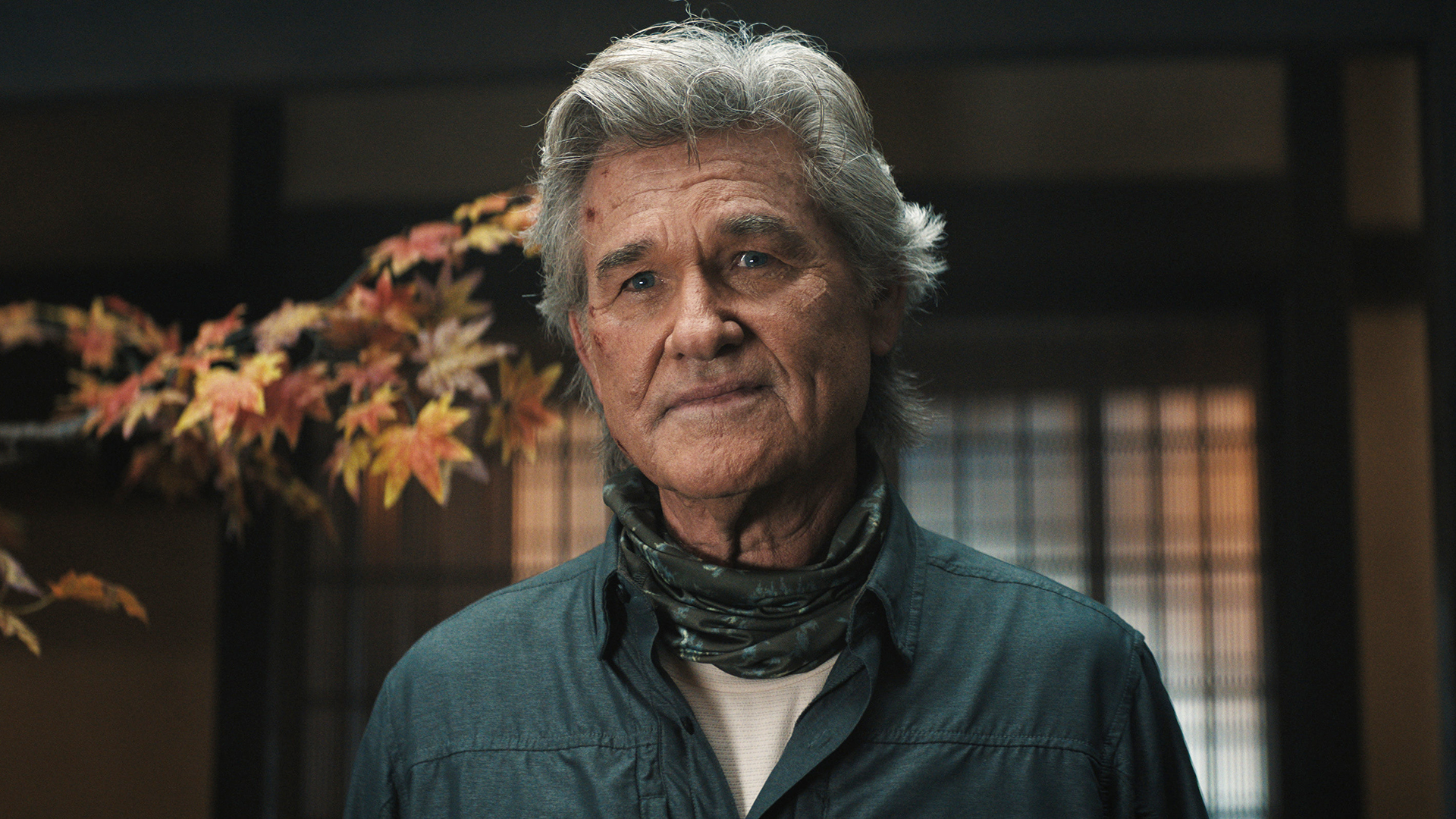 Lee Shaw looking at someone standing off-camera in Monarch: Legacy of Monsters season 2 episode 7