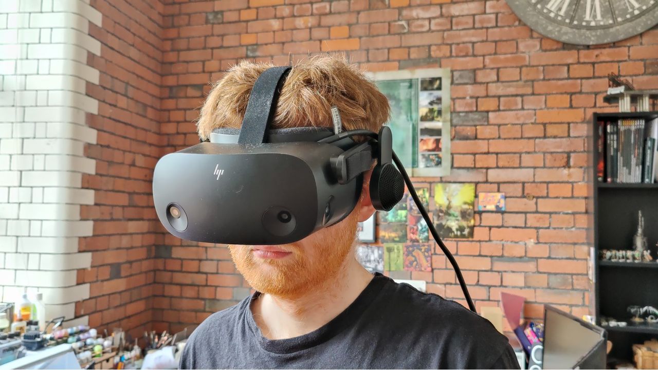 Front view of man wearing HP Reverb G2 VR Headset.