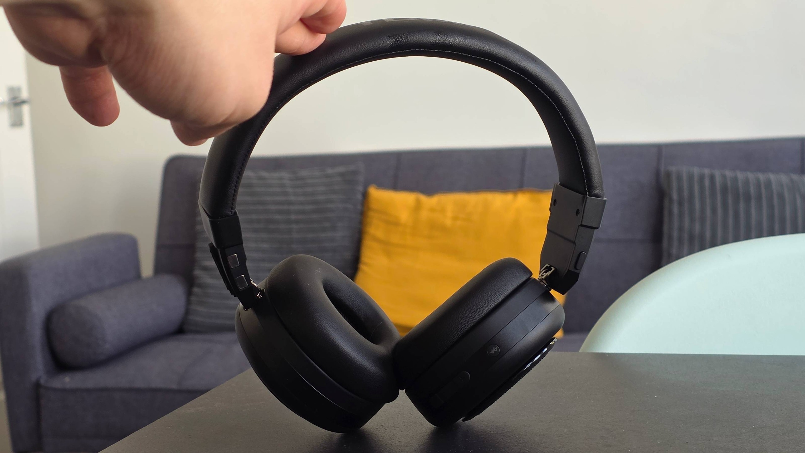The TDM Neo in headphone format on a table.