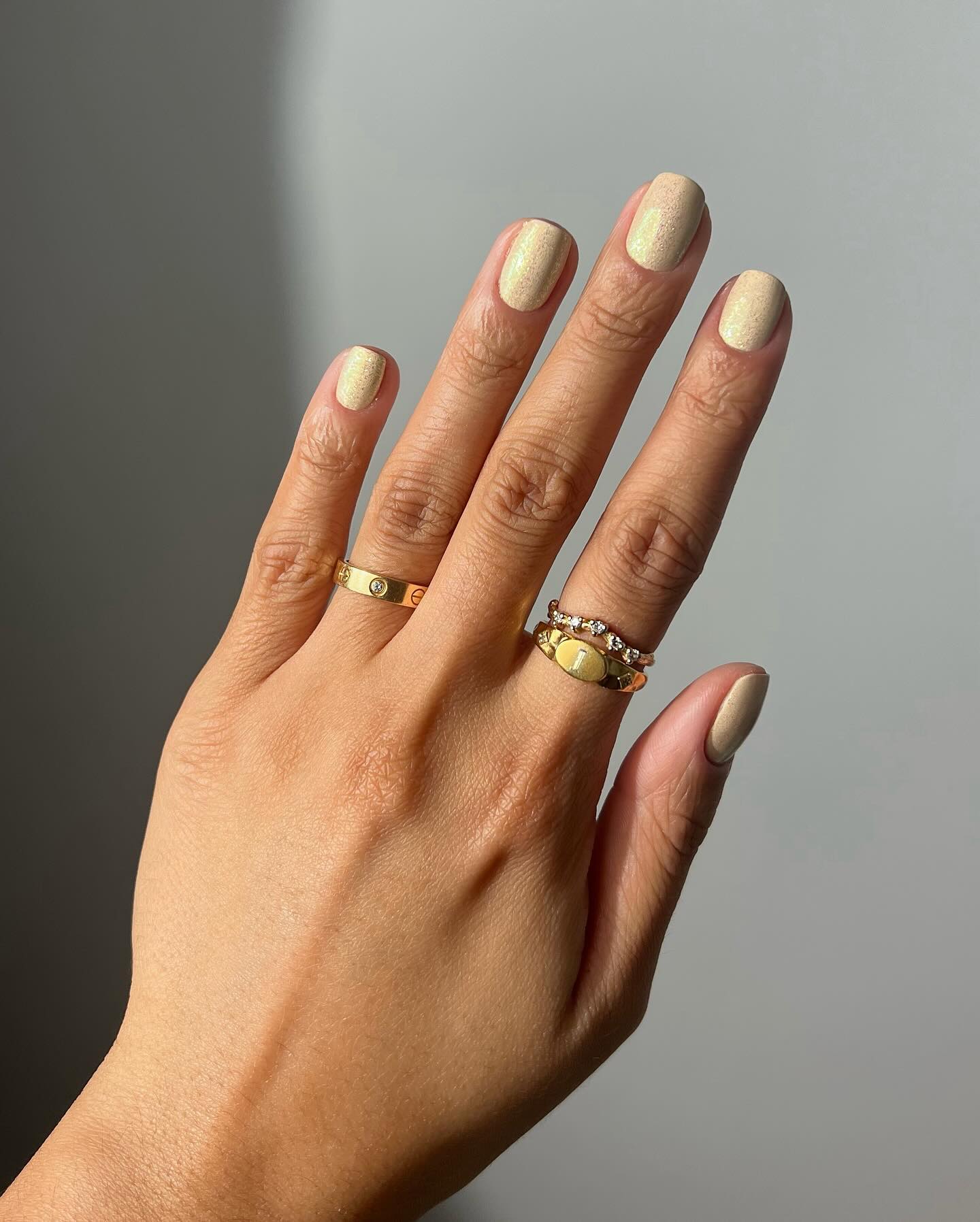 A honey yellow manicure by Iram Shelton