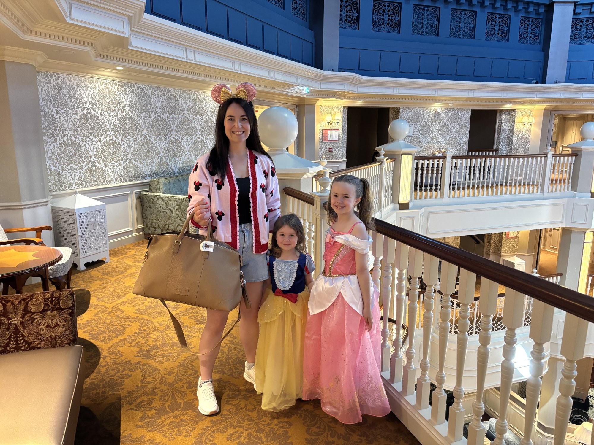 Laura Crombie and her daughters check into the Castle Club at Disneyland Paris