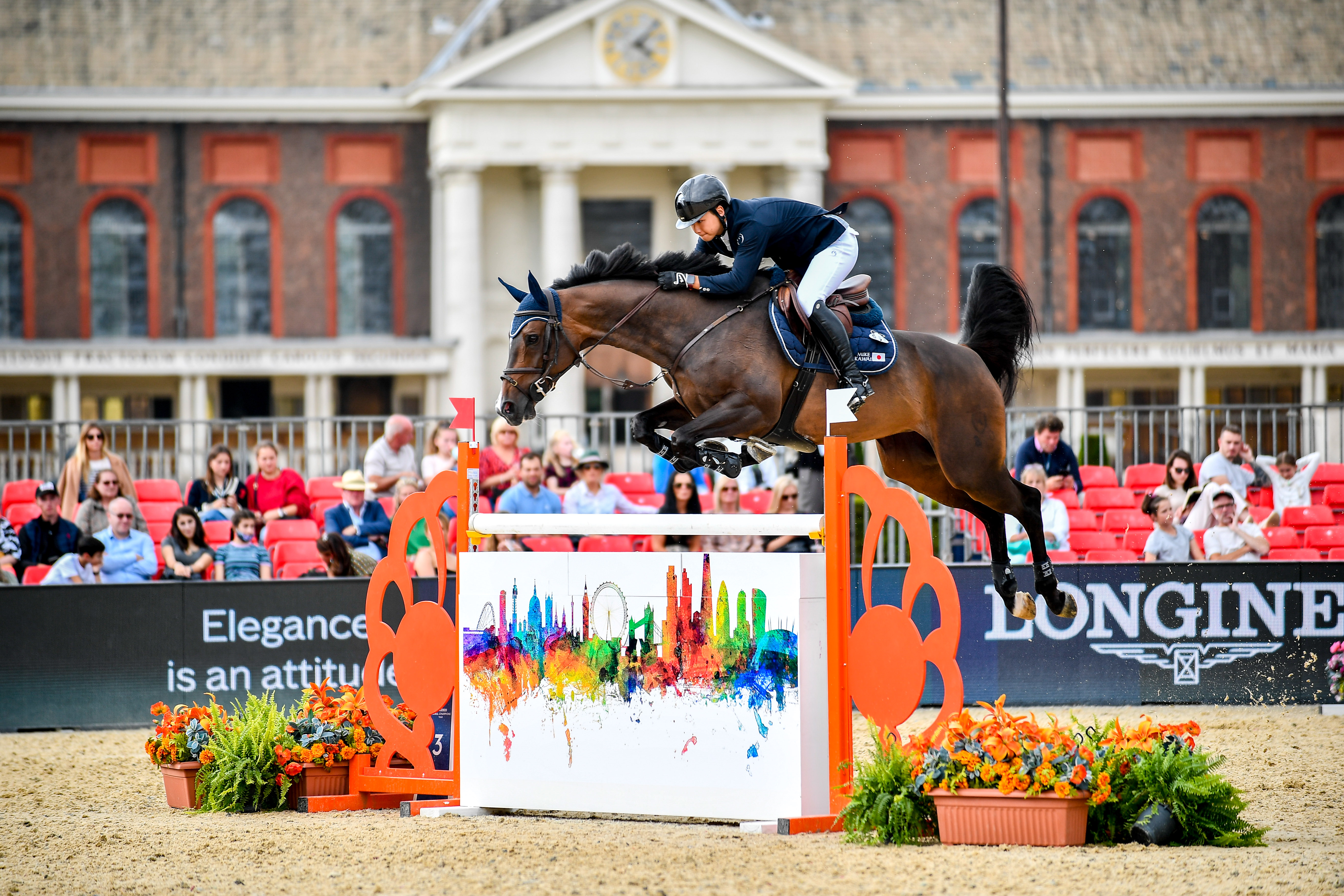 Japanese showjumper Mike Kawai and Star winning the first five-star class at the Longines Global Champions Tour of London