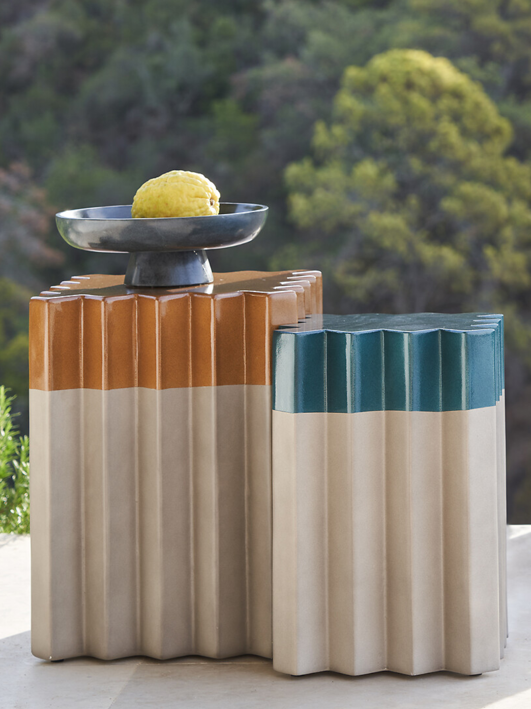 Concrete side tables with ridged borders from AM.PM