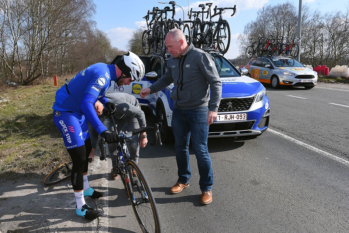 Florian Senechal deals with a puncture during Le Samyn