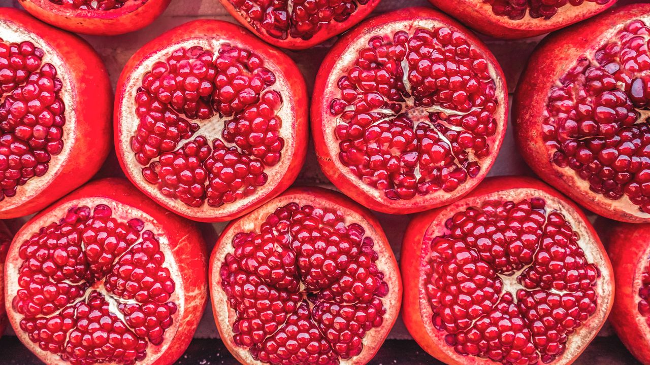 Pomegranate&#039;s chopped into halves