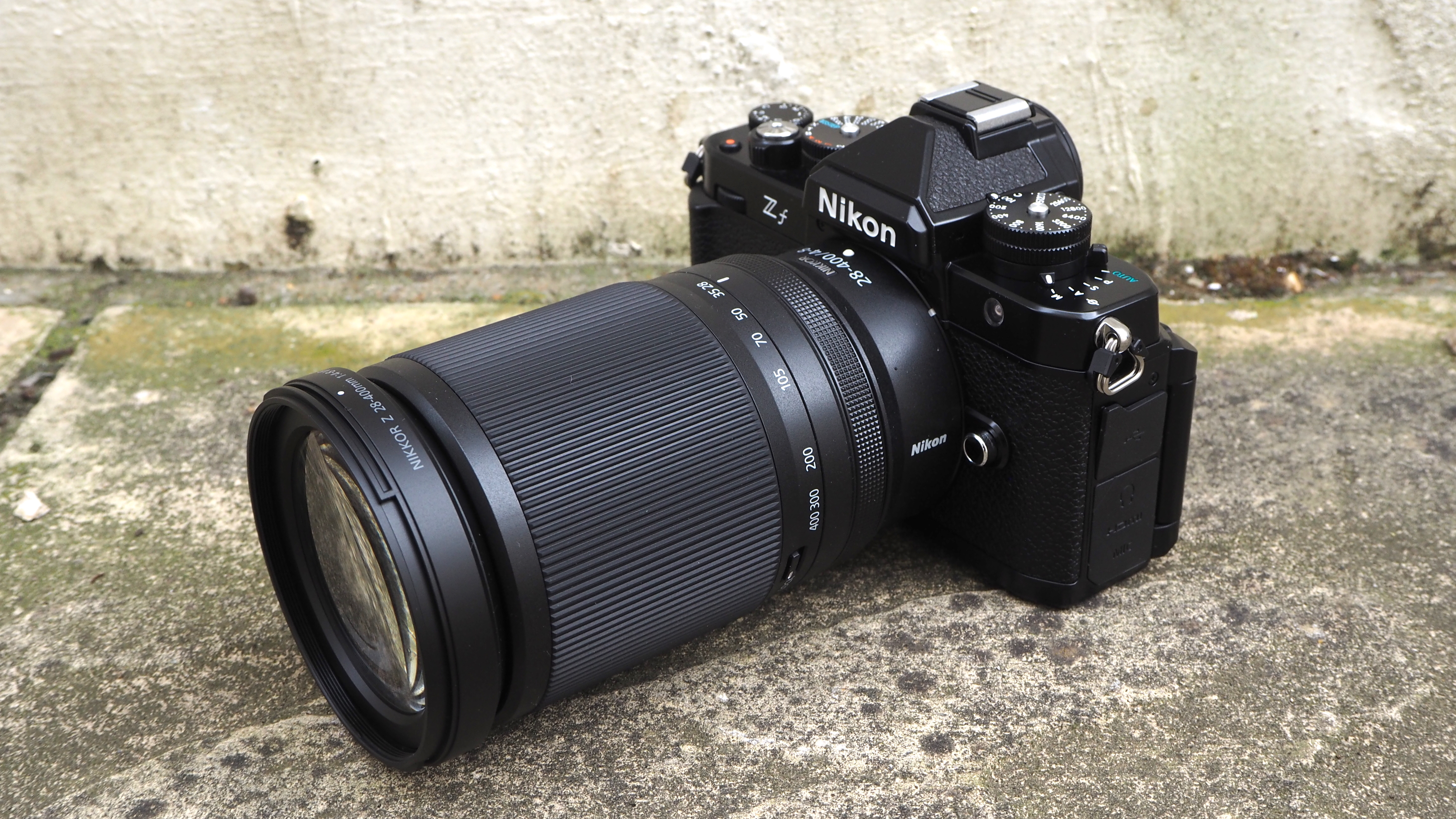 Nikon Z 28-400mm f/4-8 VR lens on a concrete surface