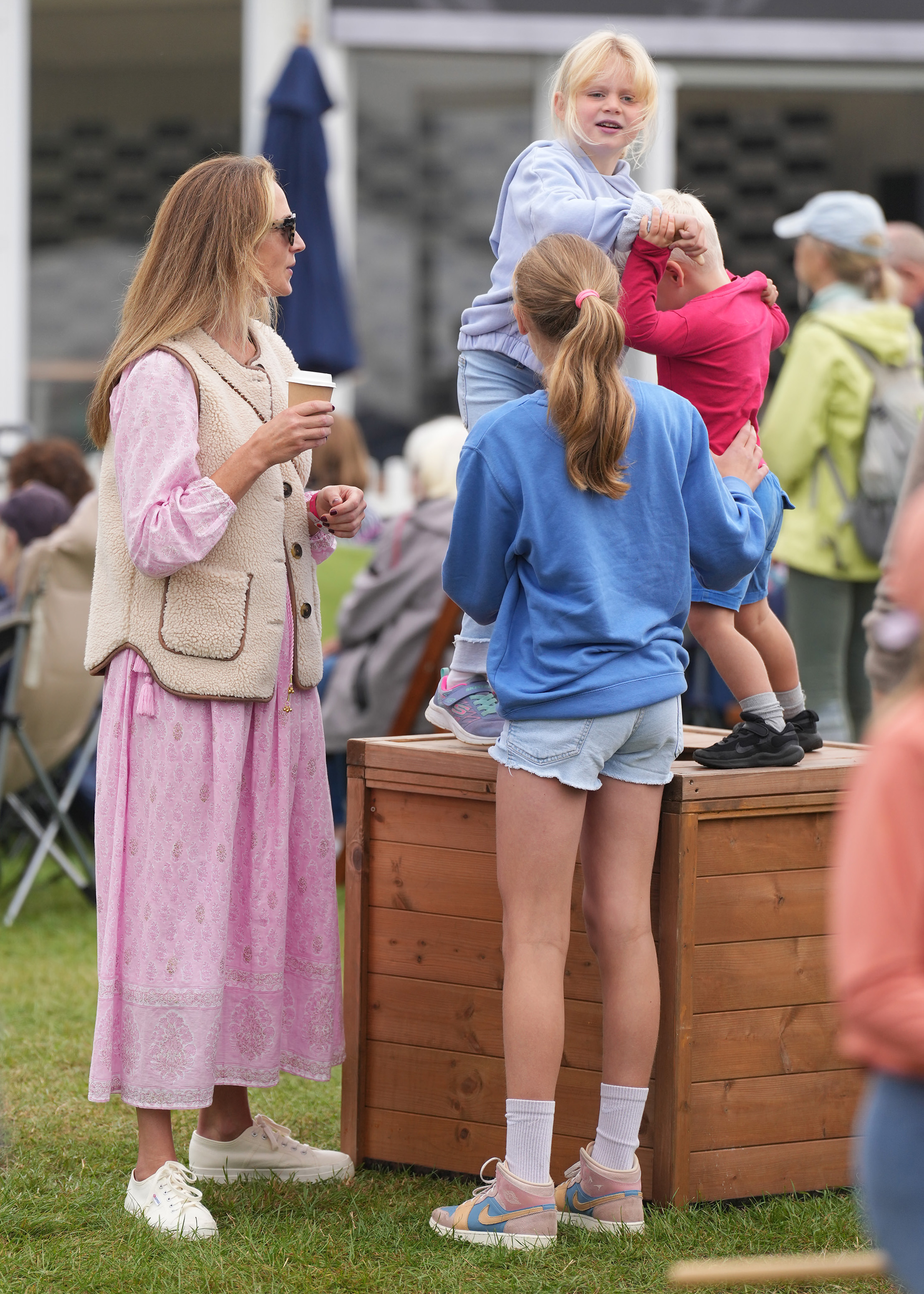 STAMFORD, UNITED KINGDOM - SEPTEMBER 07: Harriet Sperling, Lucas Tindall and Lena Tindall are seen at the Burghley Horse Trials at Burghley House, Stamford, Lincolnshire on September 07, 2024 in Stamford, United Kingdom. (Photo by Spotlight Royal/Bauer-Griffin/GC Images)