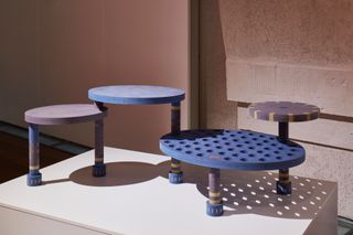 Tables installation made of wood from Finsa, part of Designers in the Middle exhibition at London Design Biennale