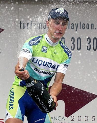 Enrico Gasparotto (Liquigas-Bianchi) lets loose with the champagne.
