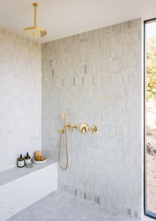 white bathroom tile in a shower room