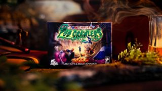 The Buttons & Bugs: Pub Crawlers box amidst lichen and a smoking cup