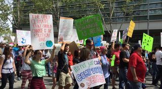 People gathered in Silicon Valley for the March for Science, many holding signs to call attention to the realities of climate change.