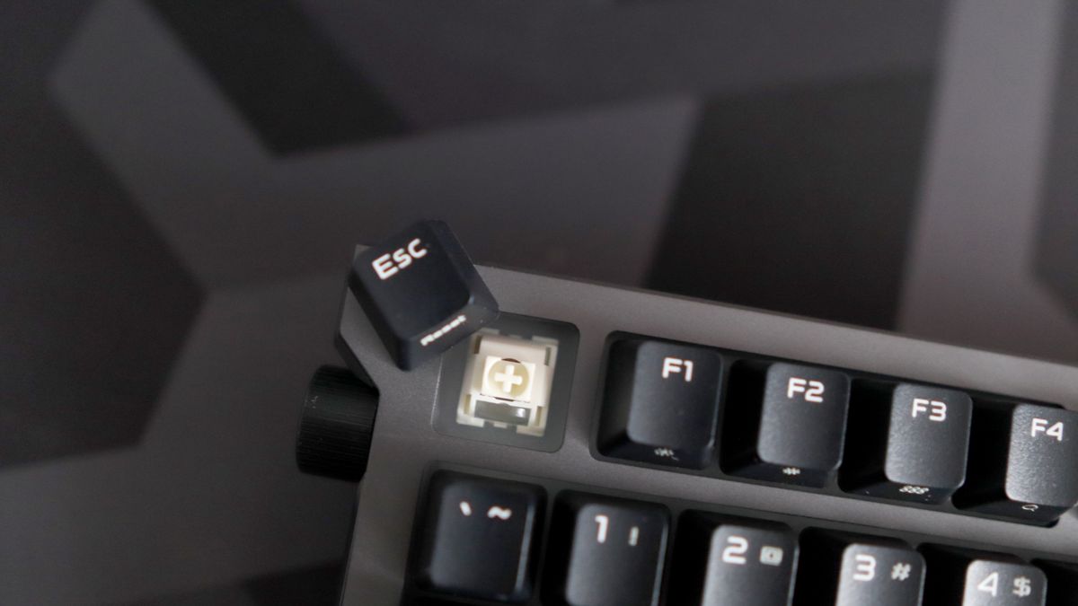 Asus ROG Strix Morph 96 Wireless on a desk mat.