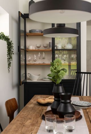 Claire and Paul Franklin's extended bungalow in Studham has mid-century monochrome style