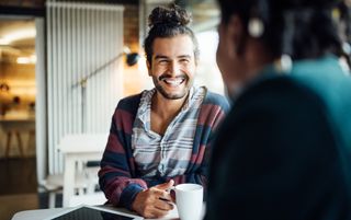 networking picture, man talking to someone else