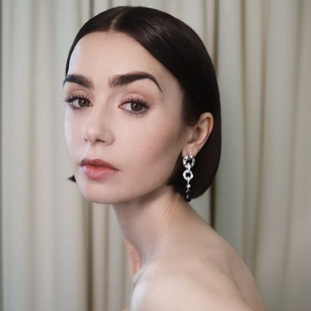 Lily Collins with short sharp bob haircut trends 2026