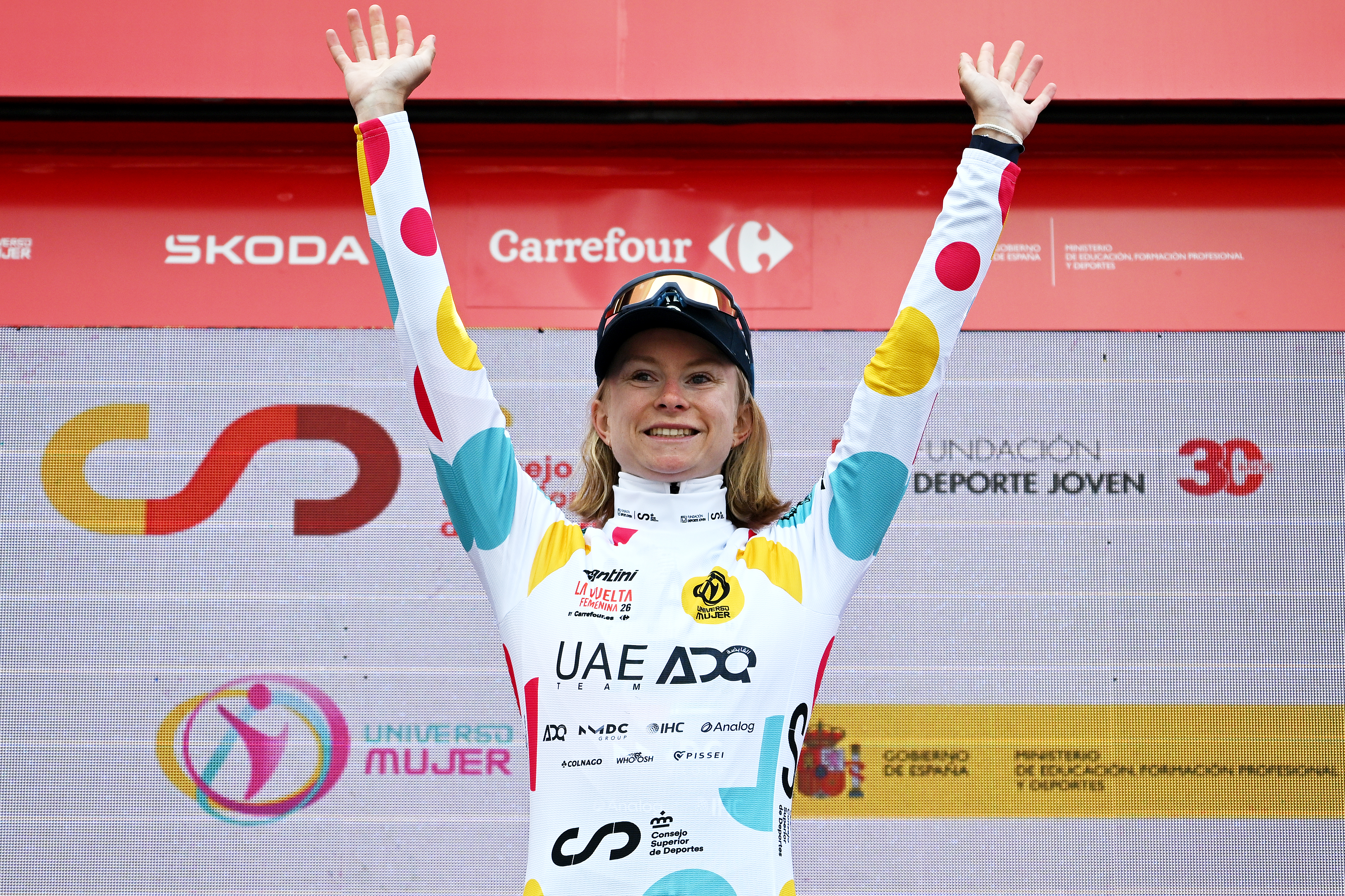 SAN-CIBRAO-DAS-VINAS, SPAIN - MAY 04: Maeva Squiban of France and UAE Team ADQ celebrates at podium as Polka dot Mountain Jersey winner during the 12th La Vuelta Femenina 2026, Stage 2 a 109.8km stage from Lobios to San Cibrao das Vinas / #UCIWWT / on May 04, 2026 in San Cibrao das Vinas, Spain. (Photo by Szymon Gruchalski/Getty Images)