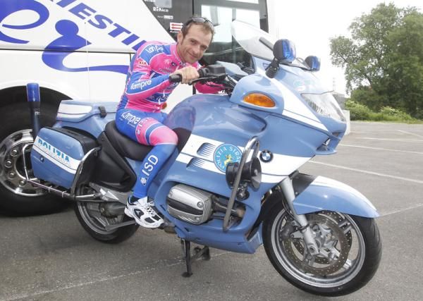 Scarponi on a motorbike