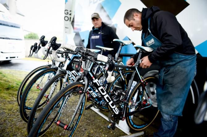AG2R La Mondiale's mechanic prepares a cyclo-cross bike before the race