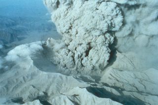 The June 15 eruption created a 1.5-mile-wide (2.5 km) collapse caldera (shown here on June 22, 1991) and filled valleys around Pinatubo with pyroclastic-flow deposits. The new summit elevation of Mount Pinatubo dropped from its pre-eruption elevation of 5,725 feet (1,745 meters) above sea level to 4,872 feet (1,485 m).