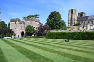 Lawn outside an old cathedral in England