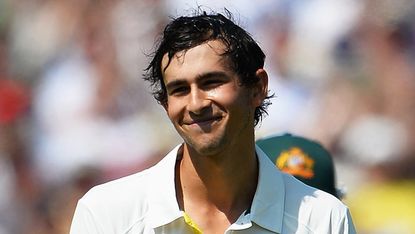 NOTTINGHAM, ENGLAND - JULY 11:Ashton Agar of Australia walks off after being dismissed by Stuart Broad of England for 98 runs during day two of the 1st Investec Ashes Test match between Engla