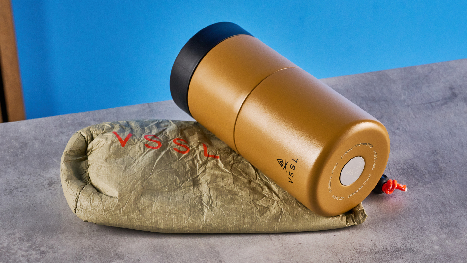 the VSSL Nest Pour Over Coffee Set in gold photographed against the blue tom's guide background