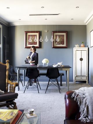 Michelle Chian in the dining area of the apartment she shares with husband Ross Jones