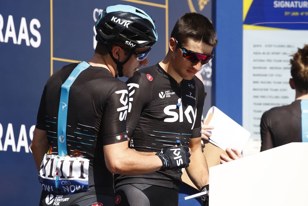Team Sky riders sign on at the start of stage 5