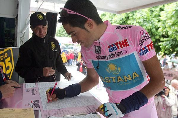 Alberto Contador signs in for his fourth day in pink.