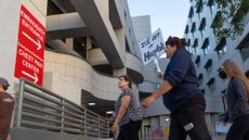Protesters against ICE march at Glendale Memorial Hospital in Glendale, California.